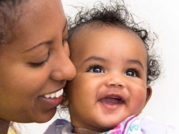 Close up of Mother and Baby's Faces Next to Each Other - KeepsakeMom