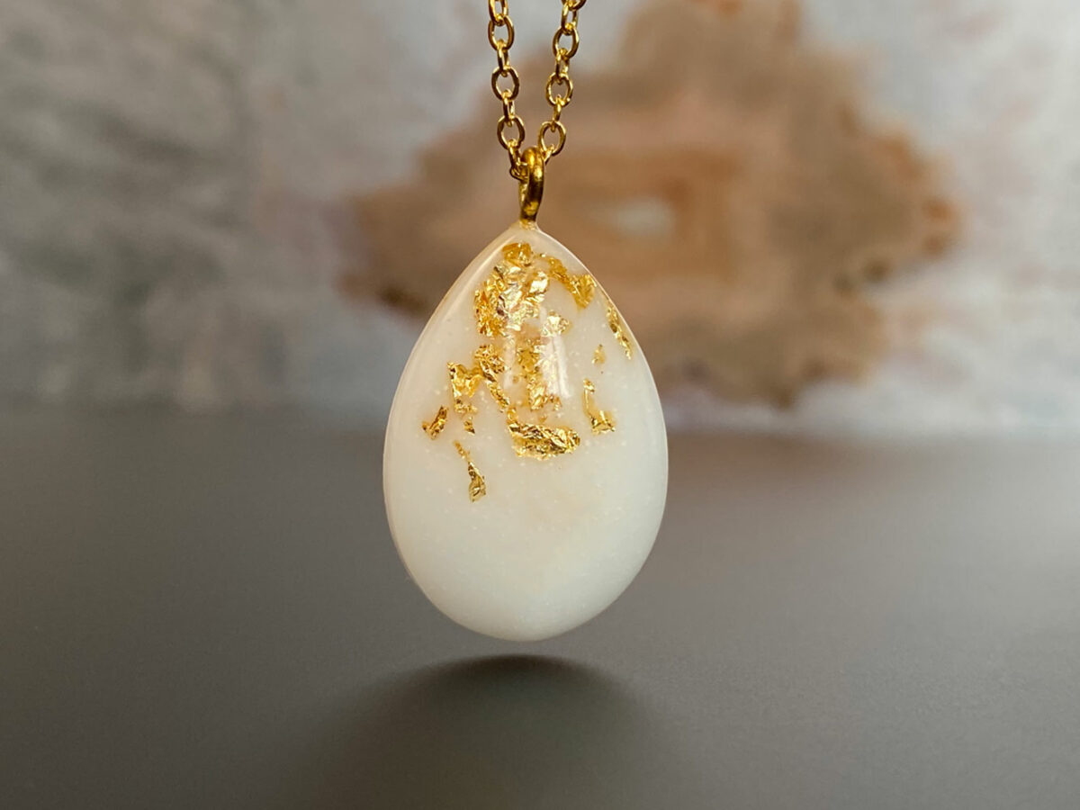 breast milk jewelry the original gold teardrop or drop necklace with gold flakes from KeepsakeMom