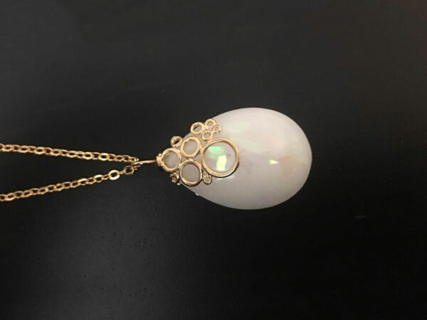 Breastmilk jewelry necklace pendant drop teardrop shape with opal effect flakes and fancy bail from KeepsakeMom gold