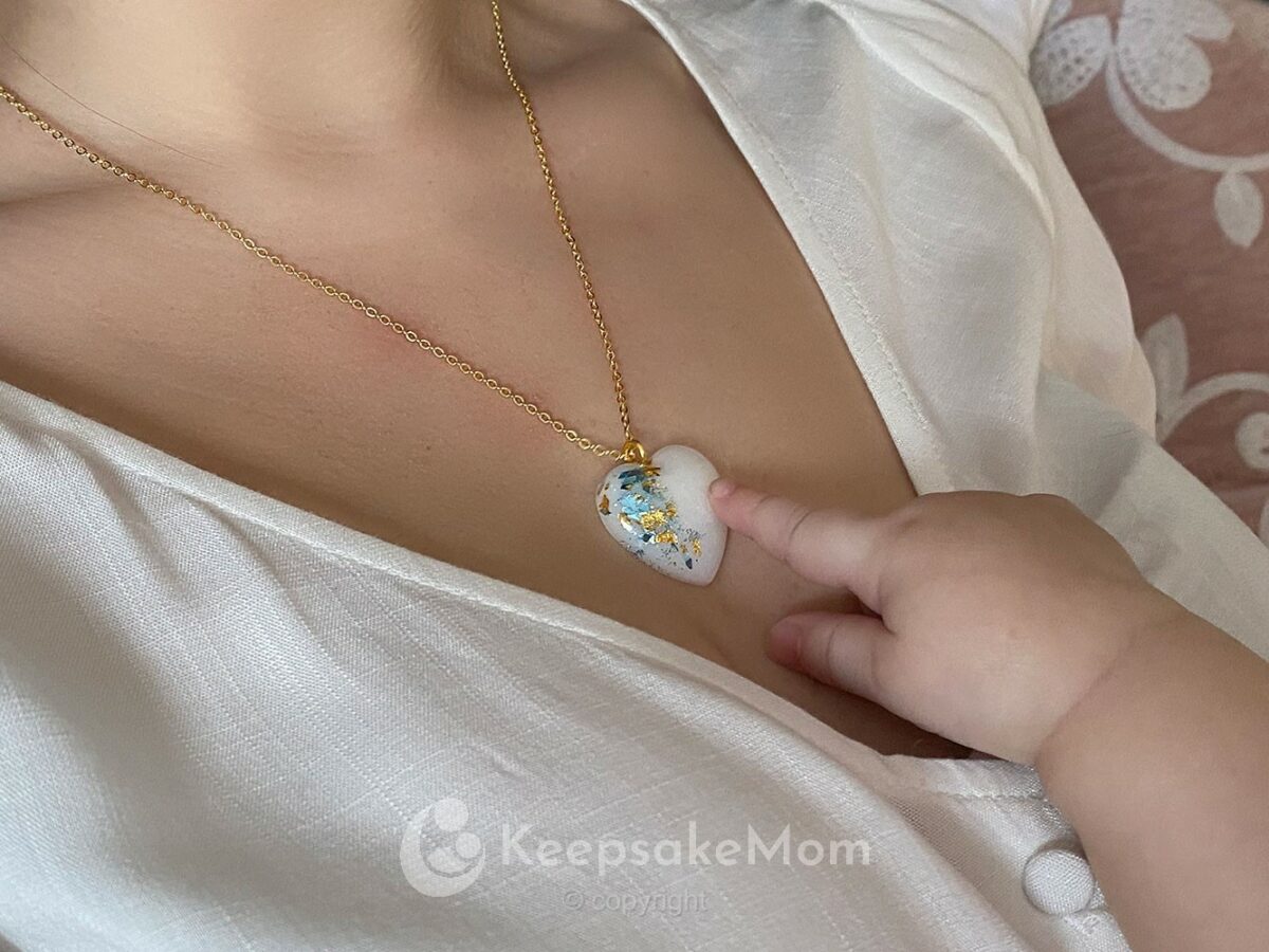 breastmilk jewelry heart with baby boy blue flakes from KeepsakeMom gold model