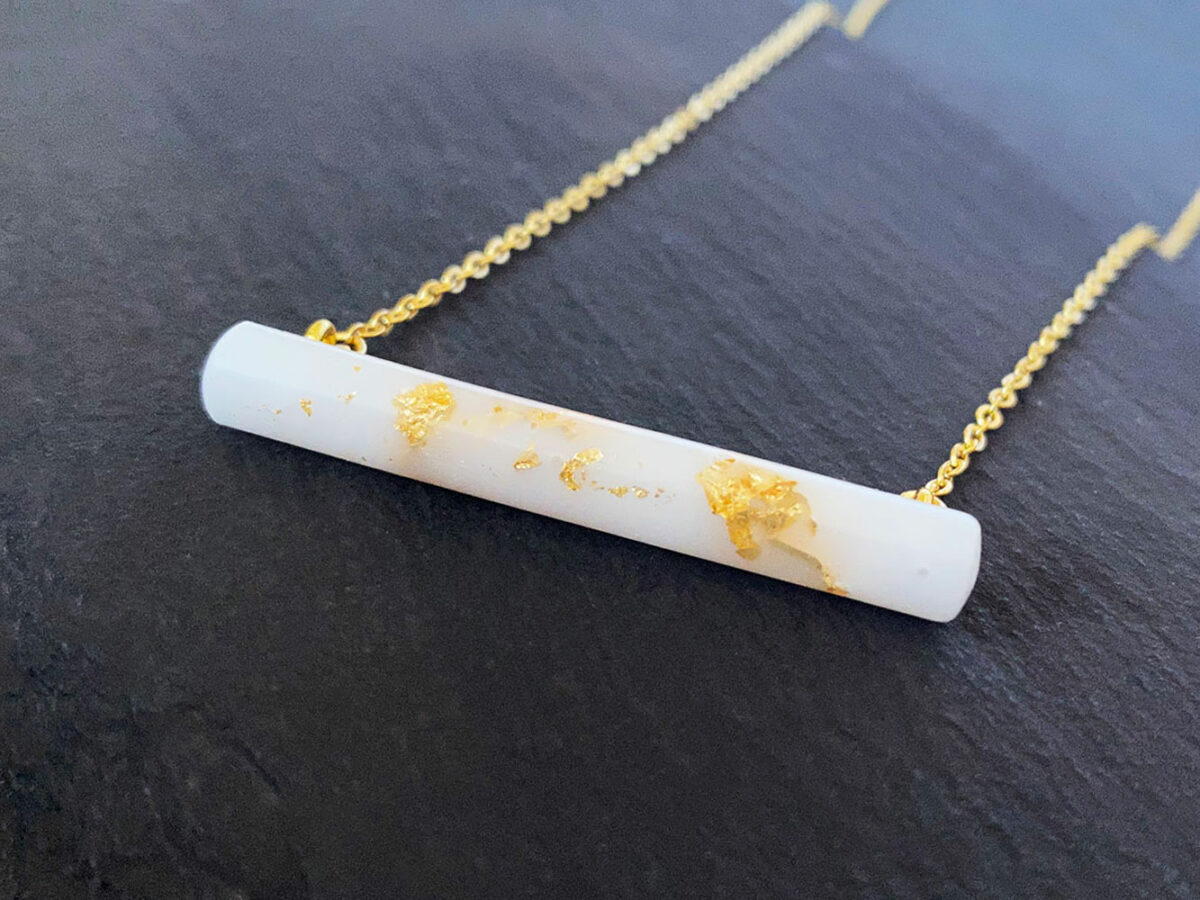 breastmilk jewelry stick bar necklace from Keepsakemom yellow gold flakes and chain