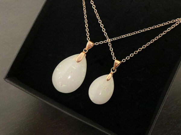 Breastmilk jewelry necklace pendant drop teardrop shape with opal effect flakes from KeepsakeMom two different sizes