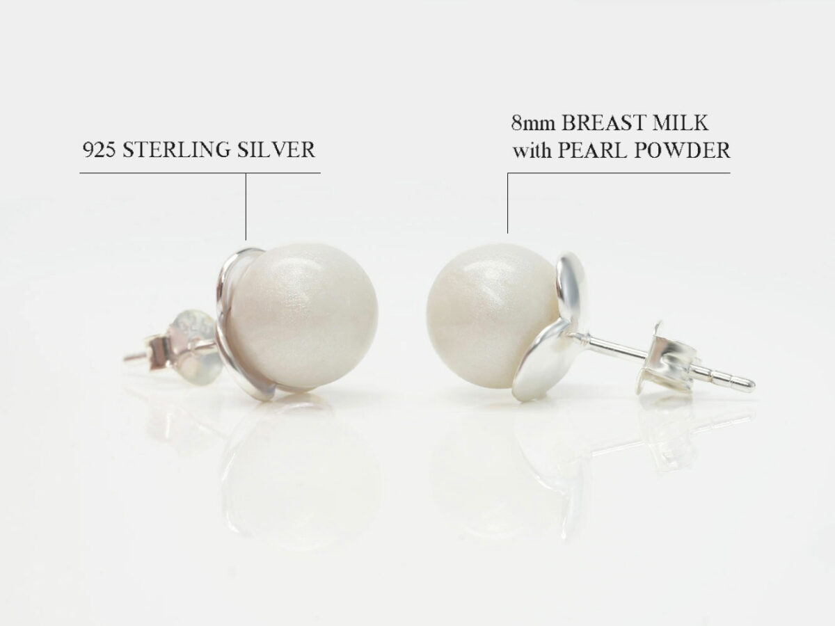 breast milk jewelry studded pearl shaped earrings with sterling silver flower-like backs on white background from KeepsakeMom