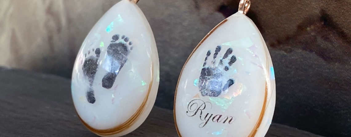 breastmilk jewelry necklaces teardrop with baby foot and handprints hair opal effect flakes and name KeepsakeMom
