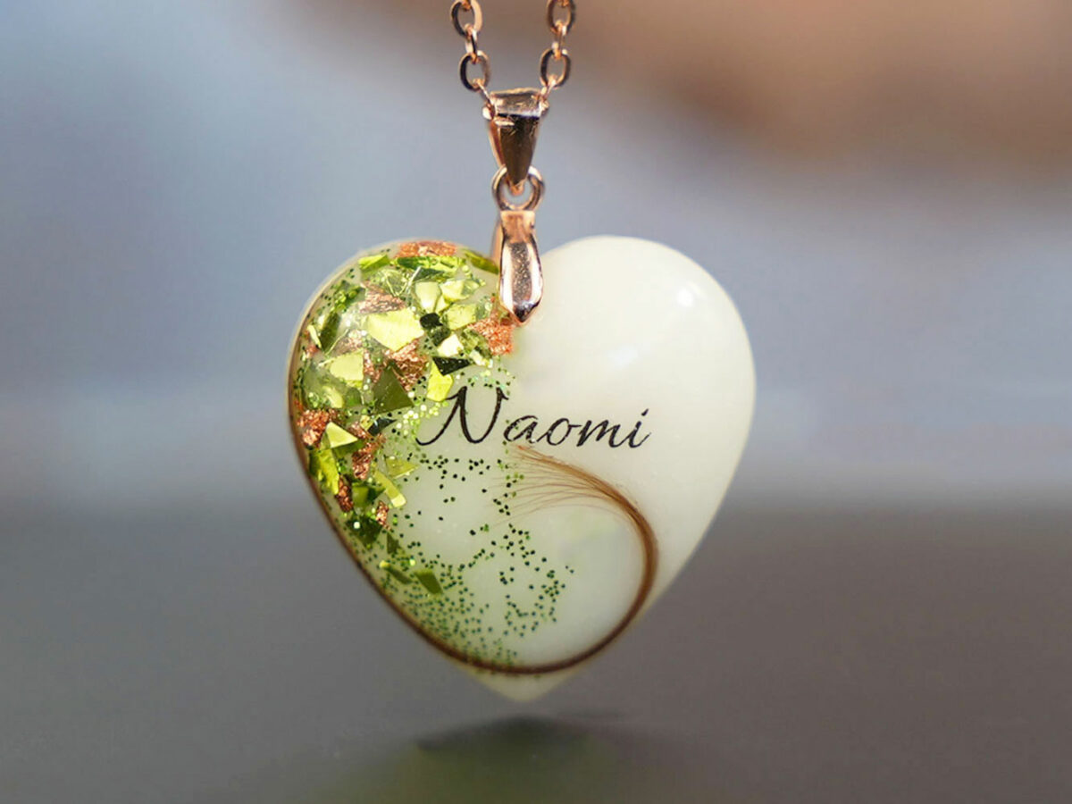 Breastmilk jewelry heart necklace with peridot green birth color and rose gold flakes, chain and bail and baby name KeepsakeMom