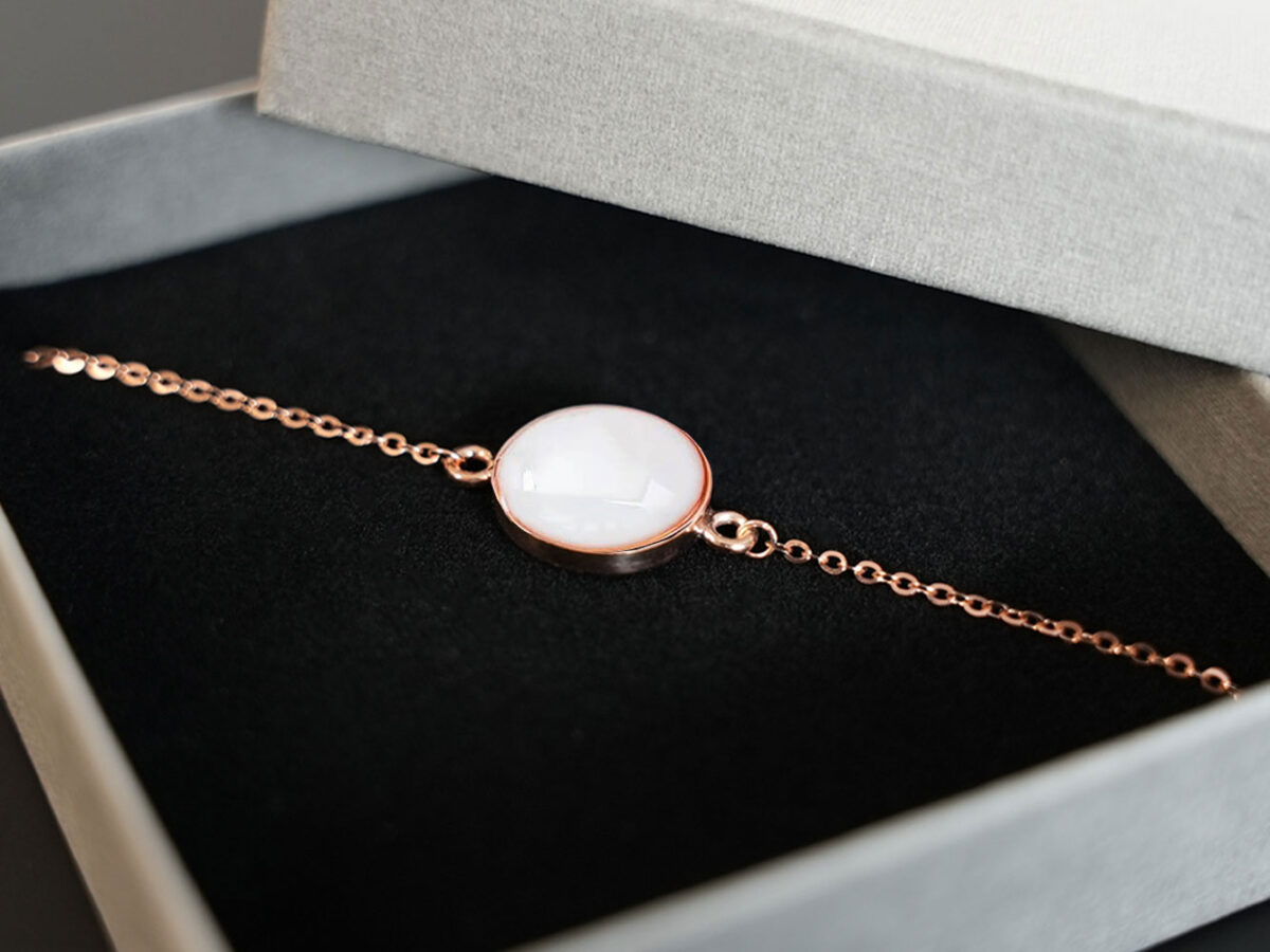 breastmilk jewelry disc bracelet rose gold keepsakemom in a box black foam