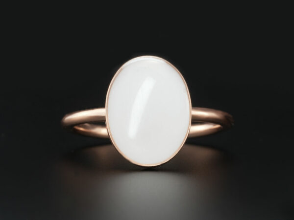 breastmilk jewelry rose gold plated sterling silver oval-shaped breast milk ring from KeepsakeMom on black background