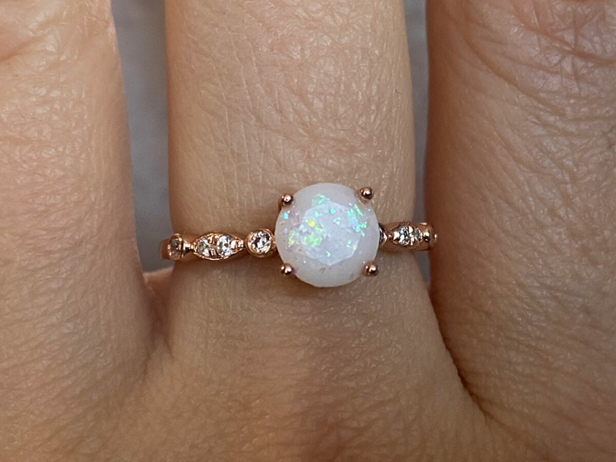 rose gold plated sterling silver breast milk jewelry with diamond shape stone, opal flakes, and diamond crystals from KeepsakeMom