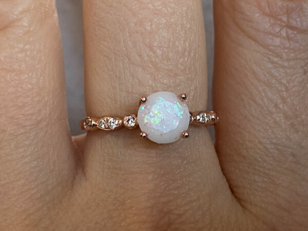 rose gold plated sterling silver breast milk jewelry with diamond shape stone, opal flakes, and diamond crystals from KeepsakeMom
