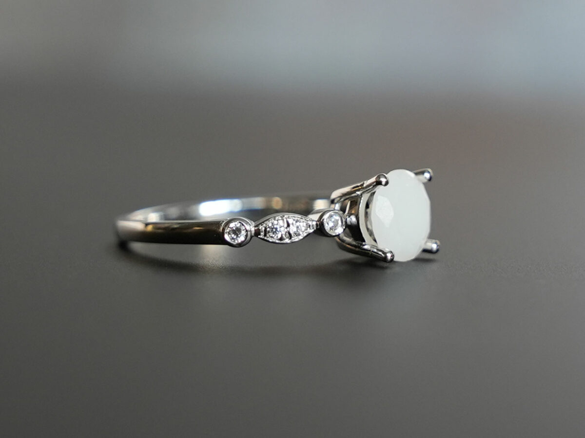 white gold plated sterling silver breast milk jewelry with diamond shape stone and diamond crystals from KeepsakeMom