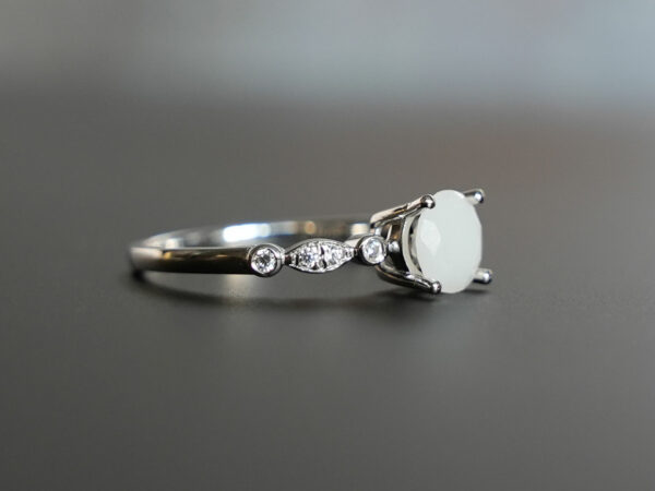 white gold plated sterling silver breast milk jewelry with diamond shape stone and diamond crystals from KeepsakeMom