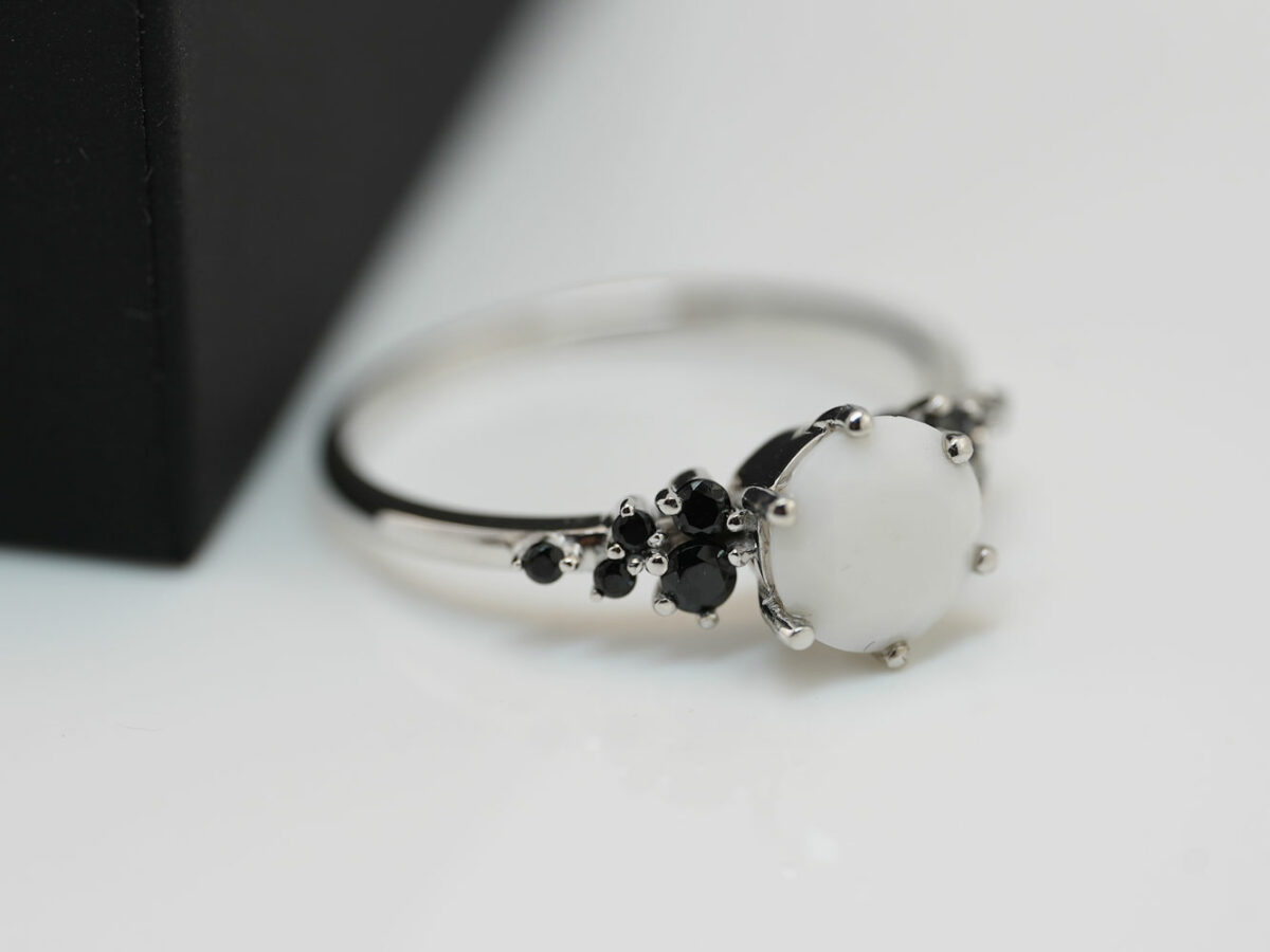 breastmilk jewelry silver ring diamond shaped milk stone and five gems on each side purple birth month colors black from KeepsakeMom