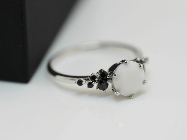 breastmilk jewelry silver ring diamond shaped milk stone and five gems on each side purple birth month colors black from KeepsakeMom
