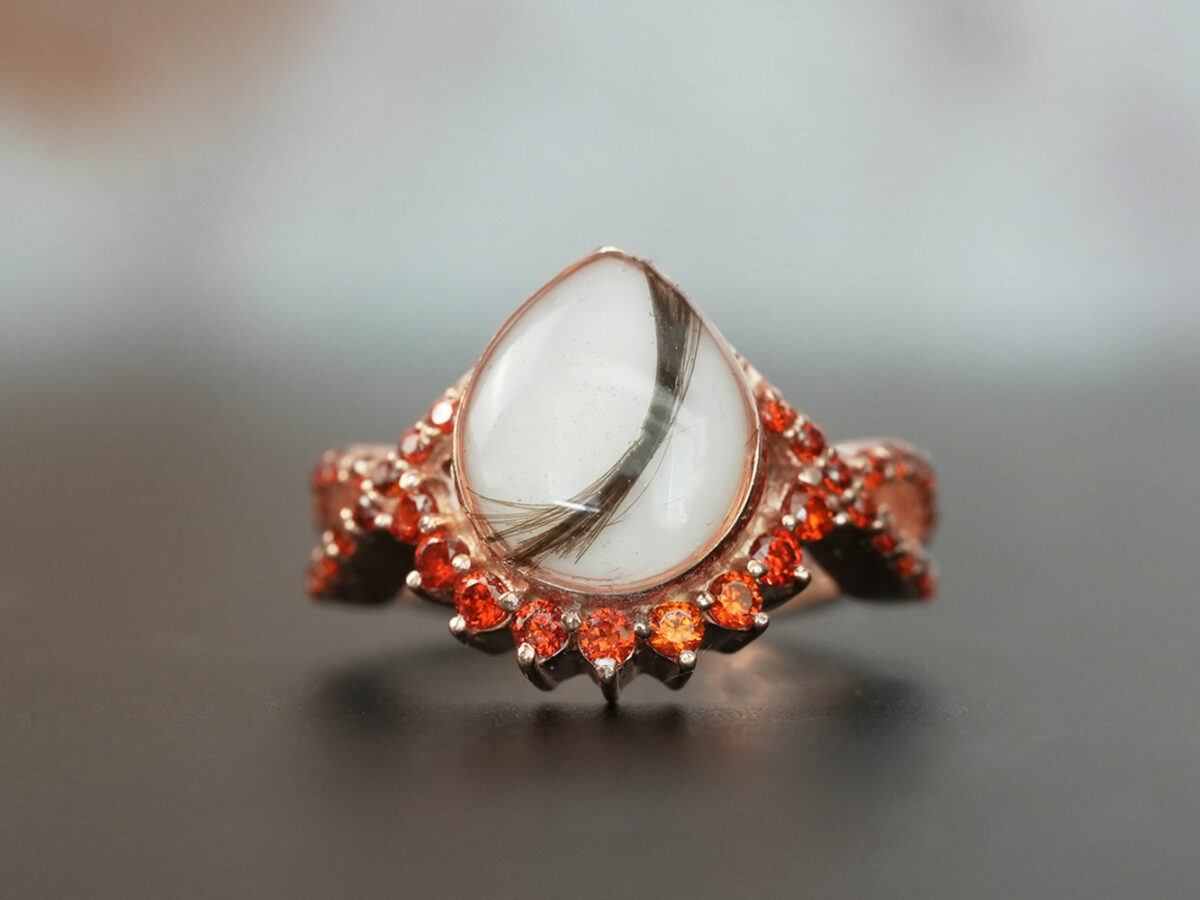 breastmilk jewelry ring crystals teardrop birth month color crystals teardrop from KeepsakeMom rose gold red January and lock of hair