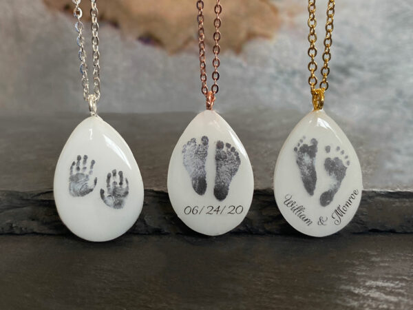 breastmilk jewelry necklace back of teardrops with baby prints and names KeepsakeMom