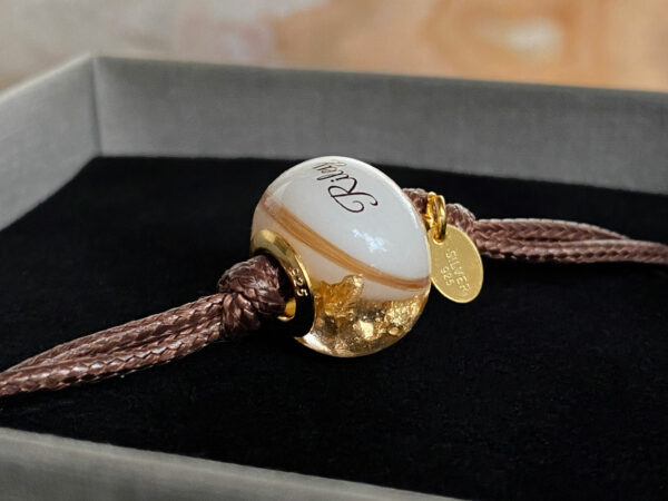 breastmilk jewelry bead bracelet with hair inclusions flakes yellow gold child's name and lock of hair keepsakemom