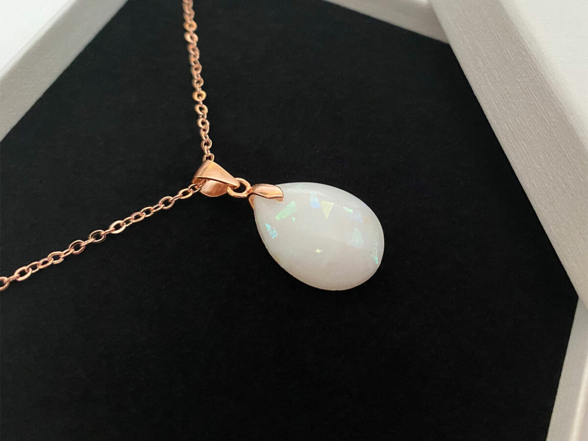 Breastmilk jewelry necklace pendant drop teardrop shape with opal effect flakes from KeepsakeMom