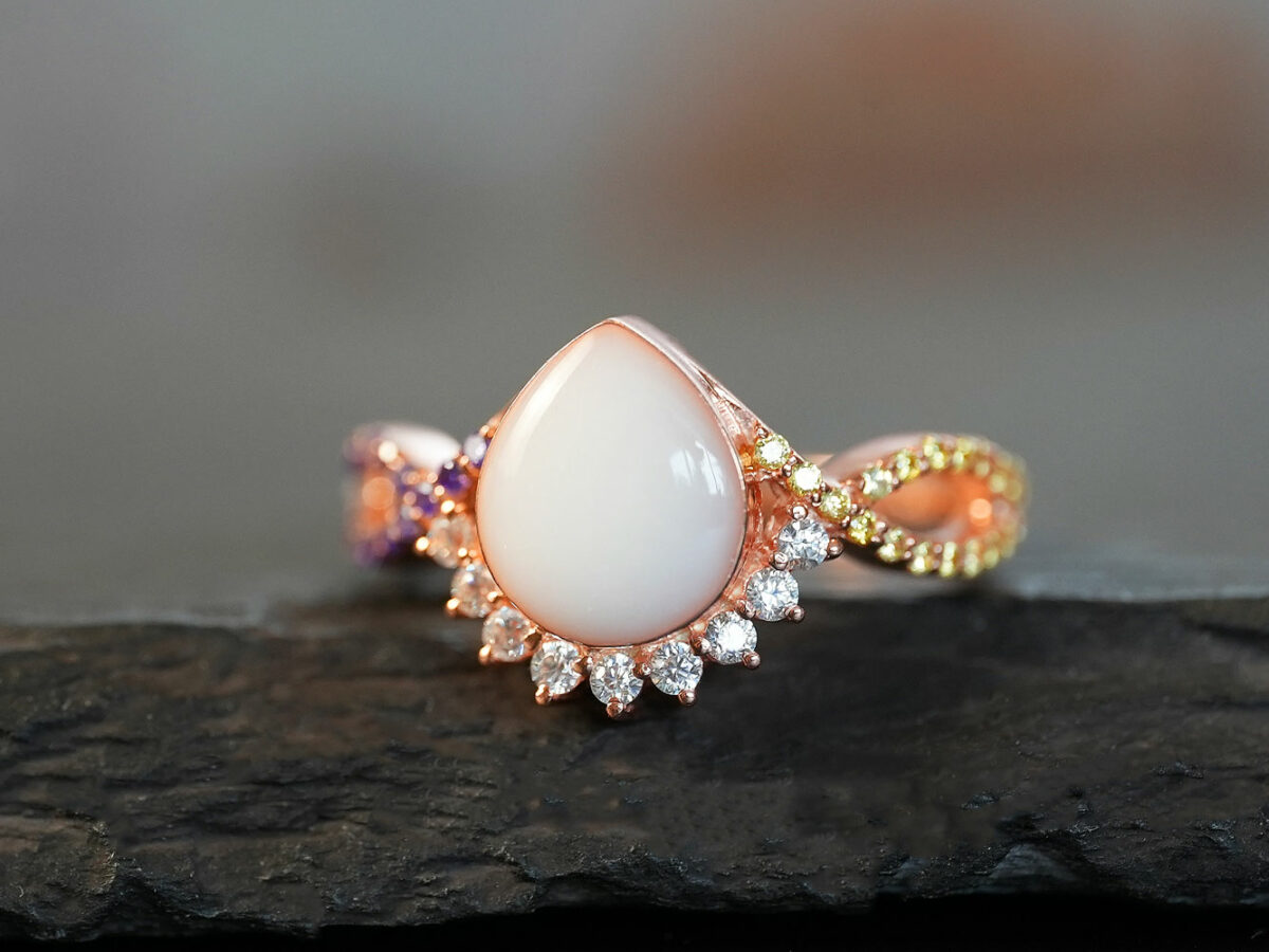 breastmilk jewelry ring crystals teardrop birth month color crystals teardrop from KeepsakeMom rose gold yellow and purple crystals
