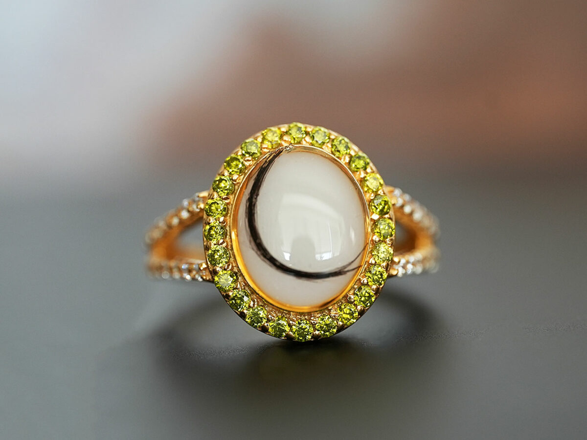 breastmilk jewelry oval ring crystals birth month colors peridot KeepsakeMom lock of hair