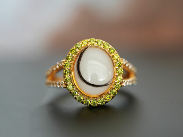 breastmilk jewelry oval ring crystals birth month colors peridot KeepsakeMom lock of hair