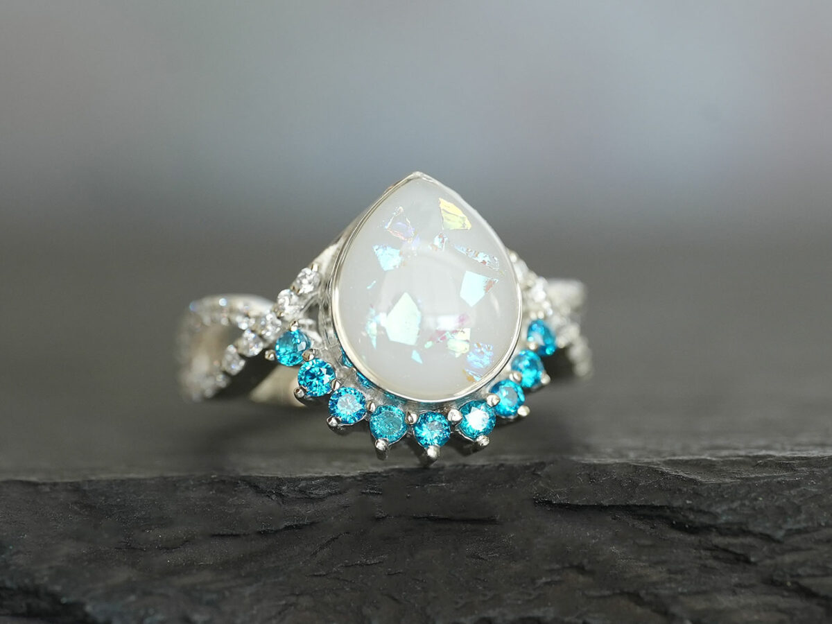 breastmilk jewelry ring crystals teardrop birth month color crystals teardrop from KeepsakeMom sterling silver white gold blue crystals