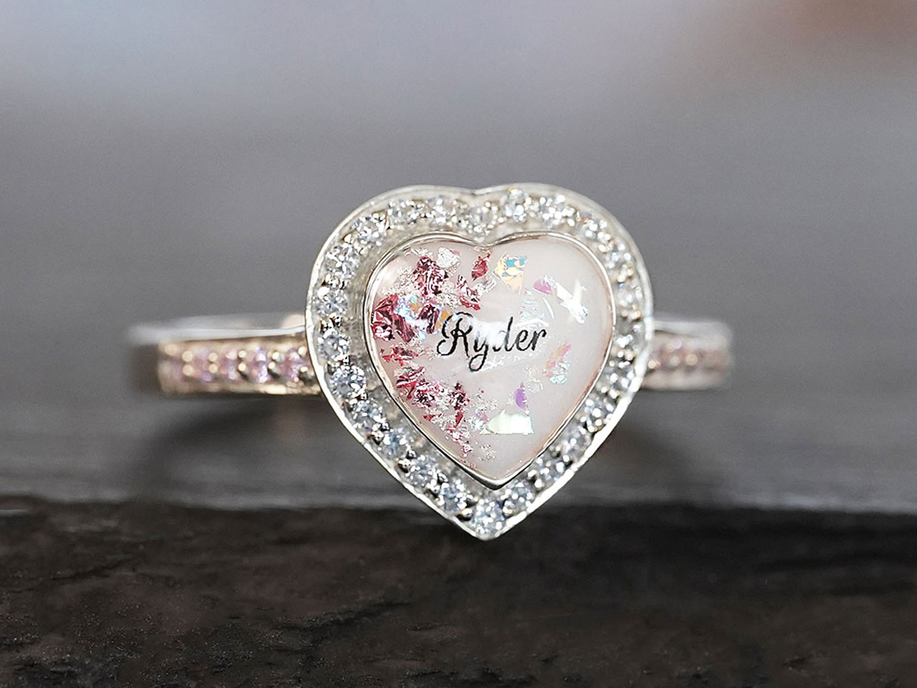 breastmilk ring heart with birth month crystals from KeepsakeMom with opal effect flakes