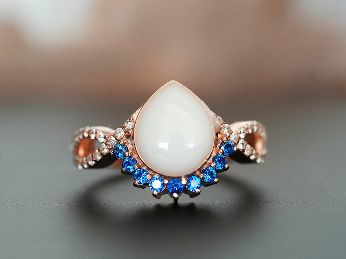 breastmilk jewelry ring crystals teardrop birth month color crystals teardrop from KeepsakeMom rose gold blue September
