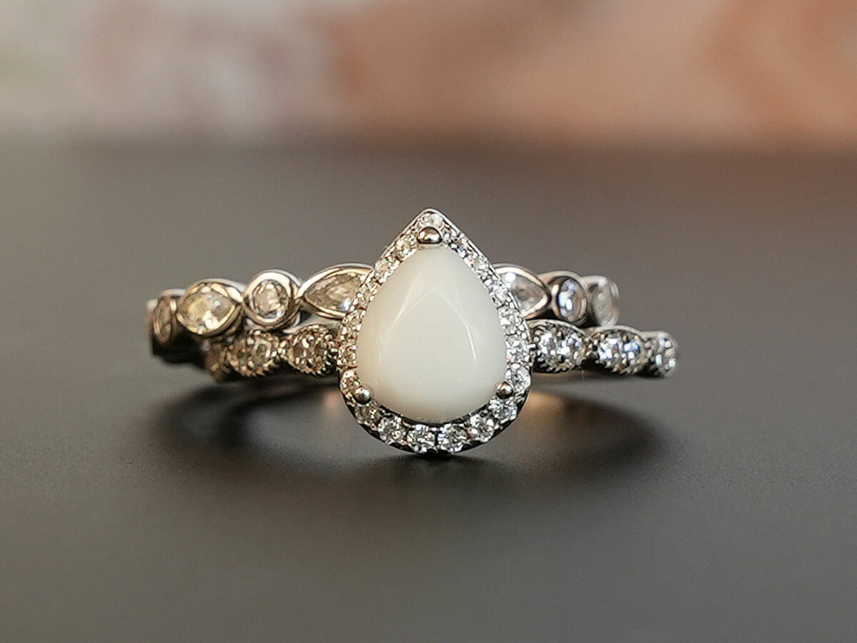 breastmilk jewelry ring set timeless beauty white gold pear shaped stone crystals two rows Keepsakemom