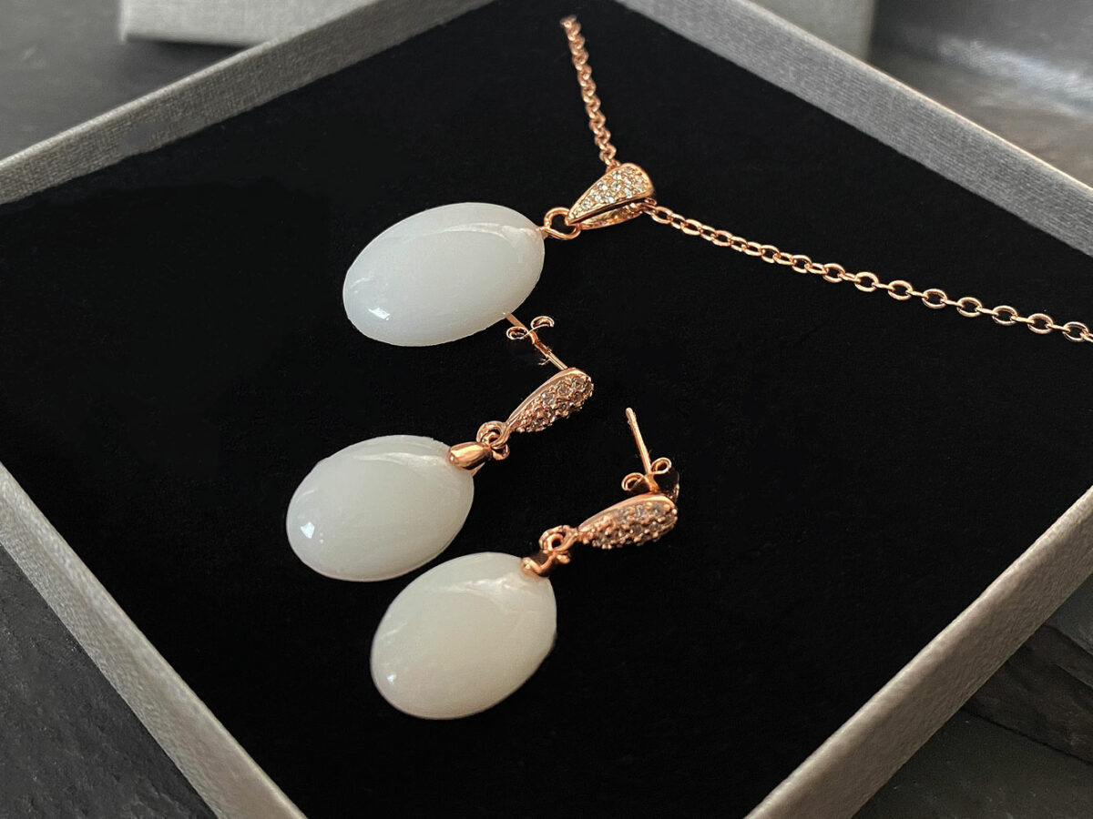 breastmilk jewelry set oval earrings and necklace with opal effect flakes from KeepsakeMom rose gold setting