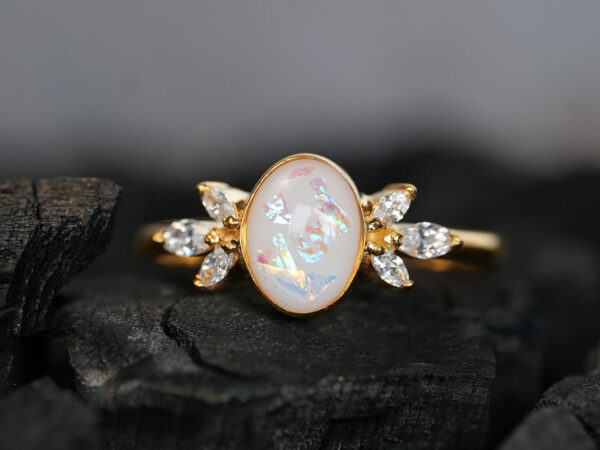 breastmilk ring burst of love oval with crystals from KeepsakeMom with opal effect flakes