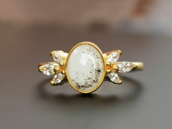breastmilk ring burst of love oval with crystals from KeepsakeMom with ashes yellow gold