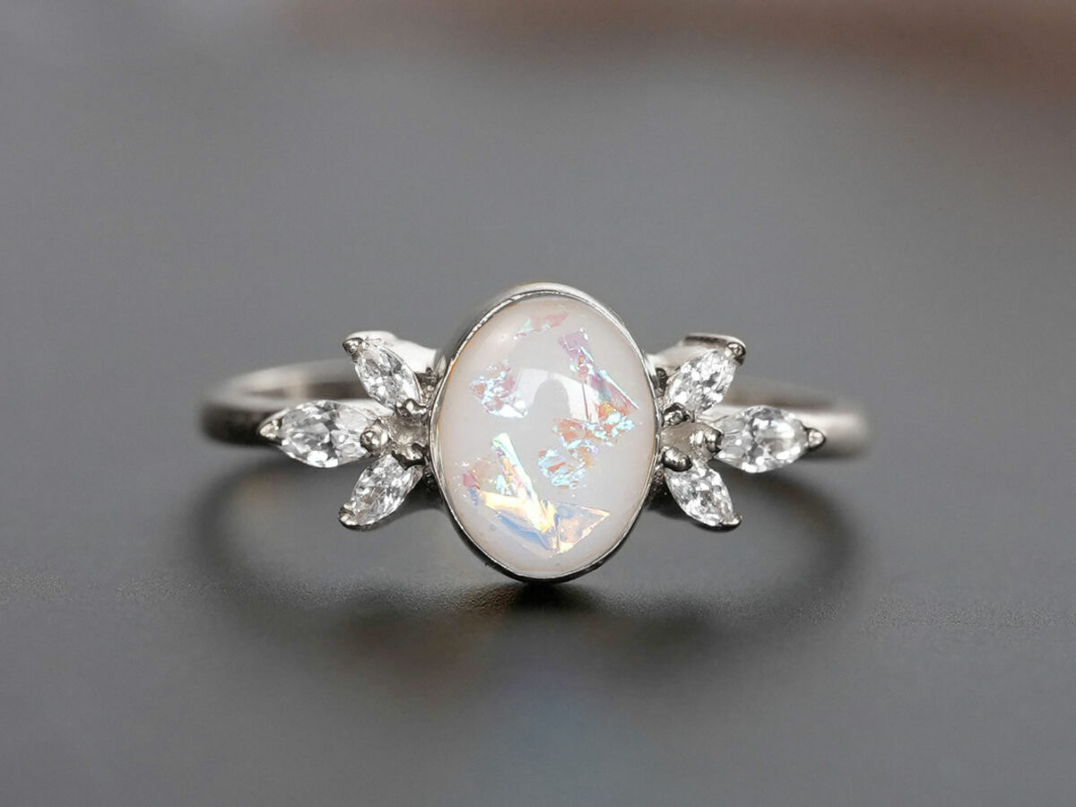 breastmilk ring burst of love oval with crystals from KeepsakeMom with opal effect flakes sterling silver
