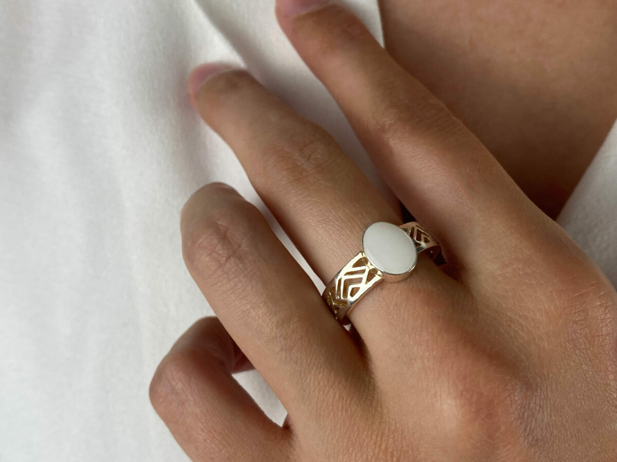 breastmilk jewelry oval stone ring with thick filigree band KeepsakeMom model hand