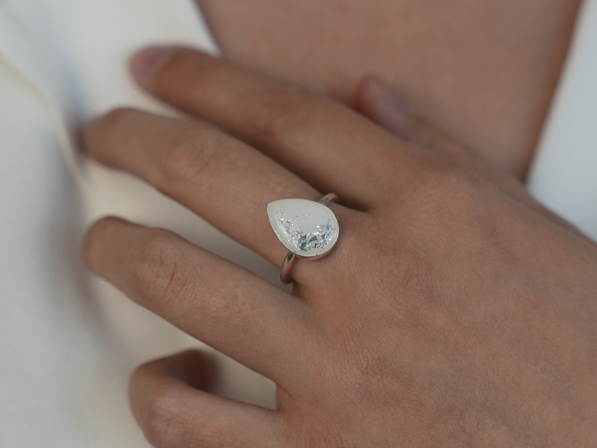 sterling silver teardrop ring, breast milk stone with silver flakes from KeepsakeMom