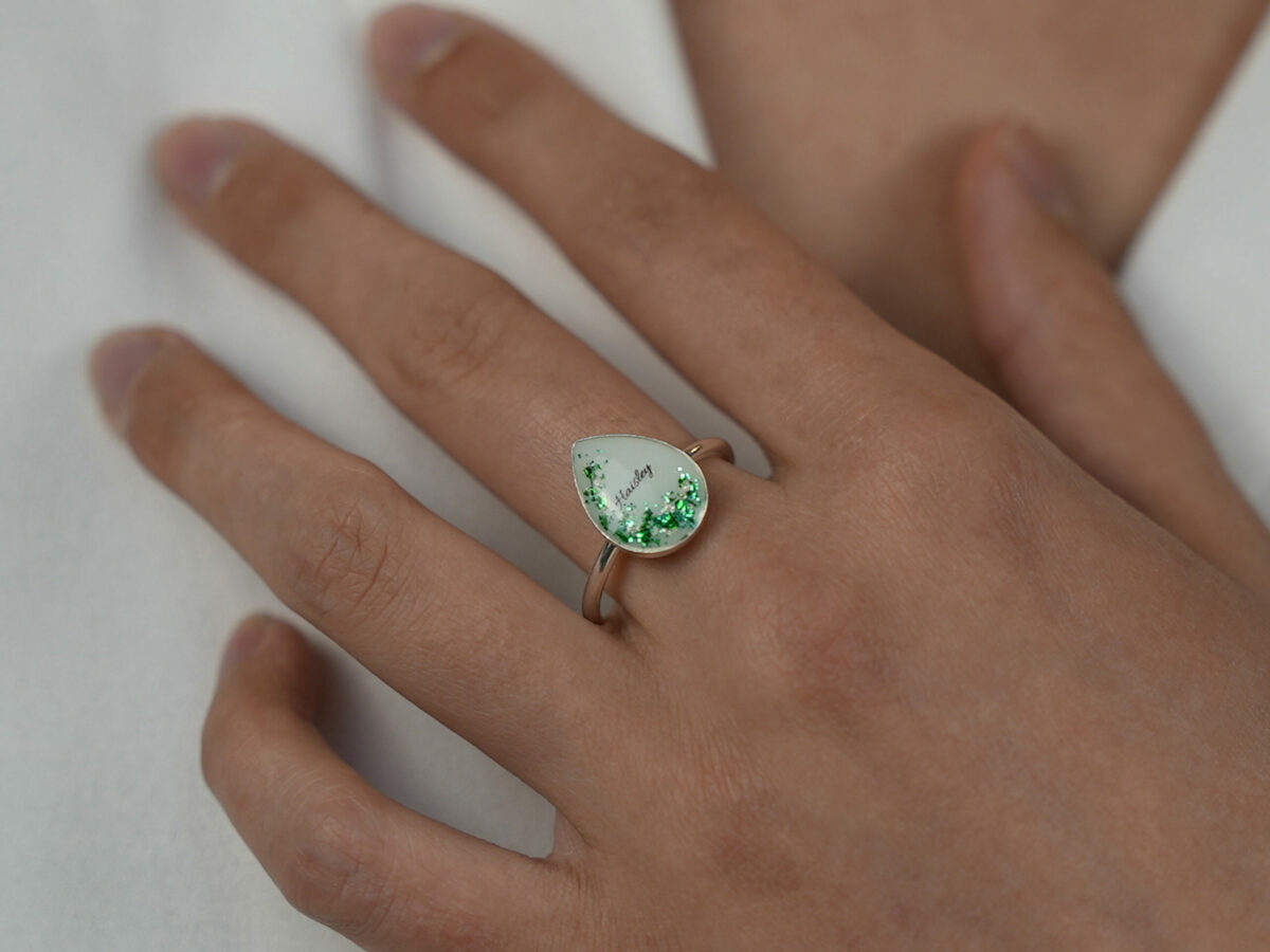 sterling silver teardrop ring, breast milk stone with green shimmer and name from KeepsakeMom