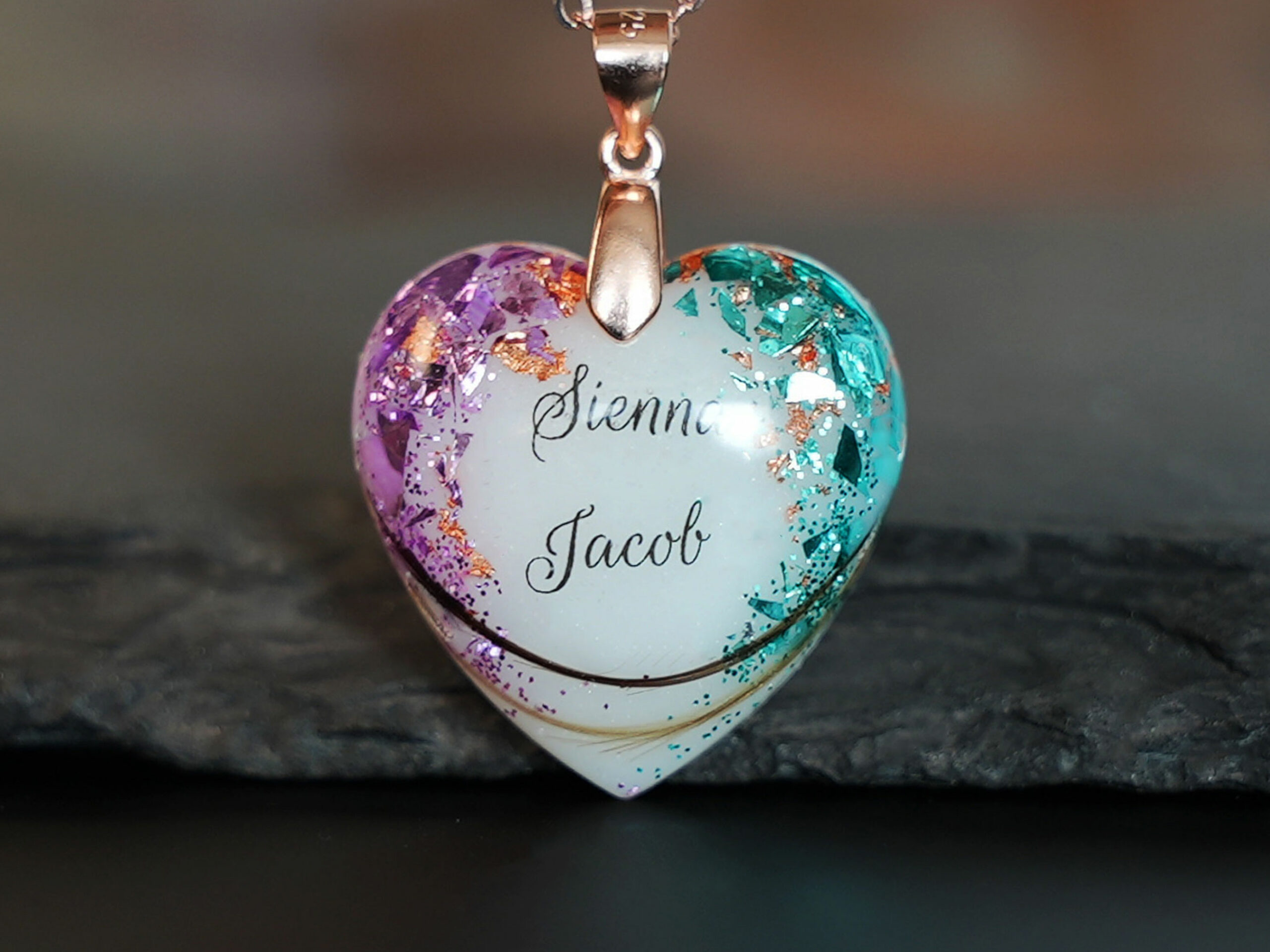 Breastmilk jewelry heart necklace with purple June and December purple and turquoise birth color, rose gold chain and bail and names from KeepsakeMom