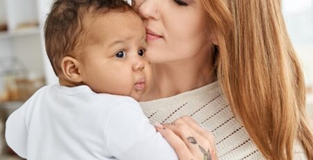 Loving mother holding her son