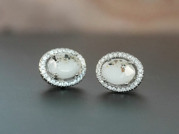 breastmilk jewelry earrings studded oval with sterling silver rim with crystals from KeepsakeMom faceted oval breastmilk stone and placenta
