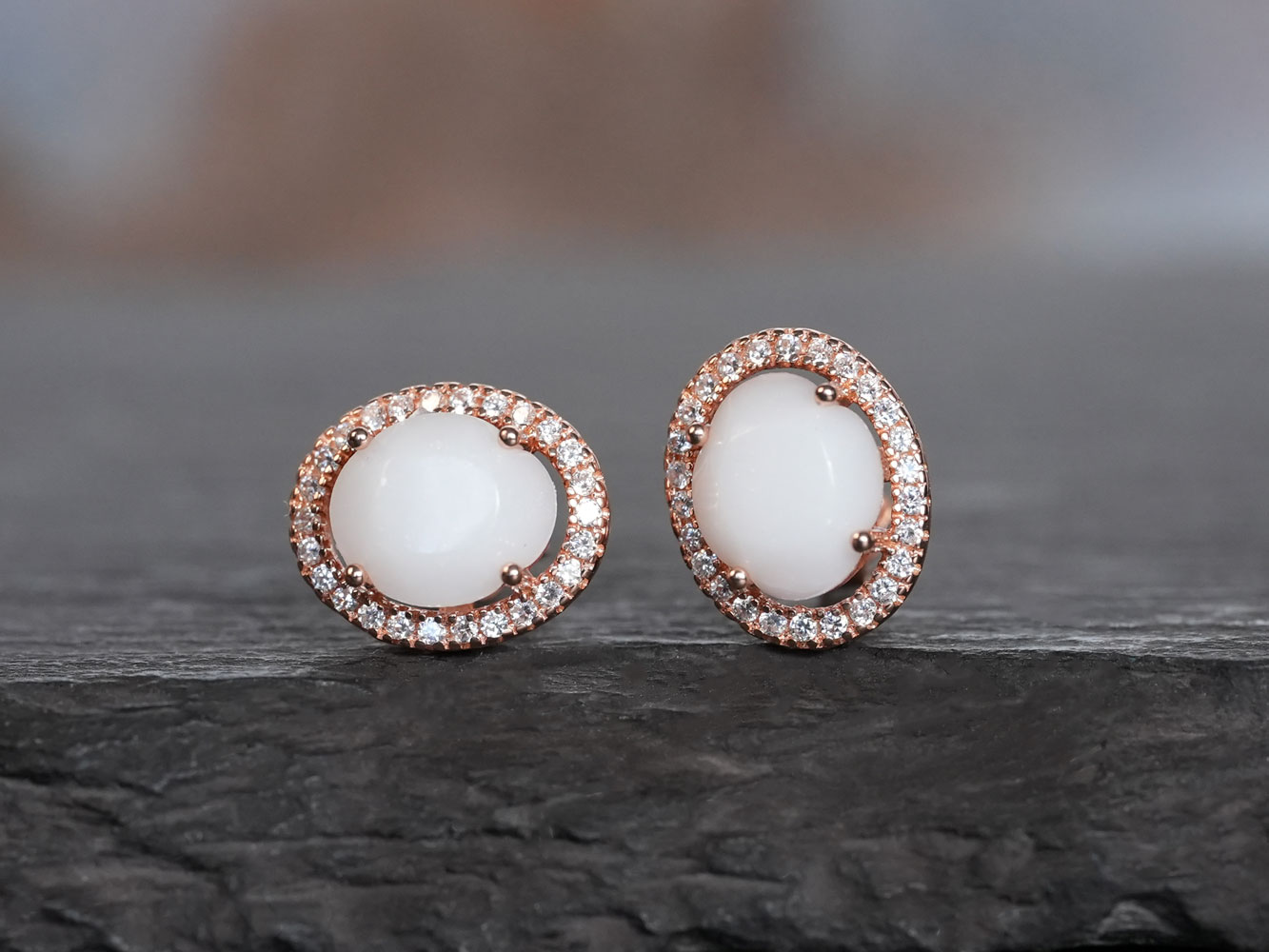 breastmilk jewelry earrings studded oval with sterling silver rose gold plated rim with crystals from KeepsakeMom faceted oval breastmilk stone