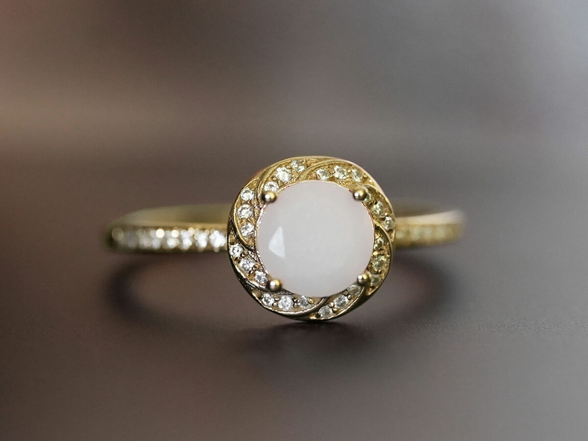 yellow gold plated sterling silver ring, diamond-shaped breast milk stone with diamond crystals on the band and around the halo from KeepsakeMom