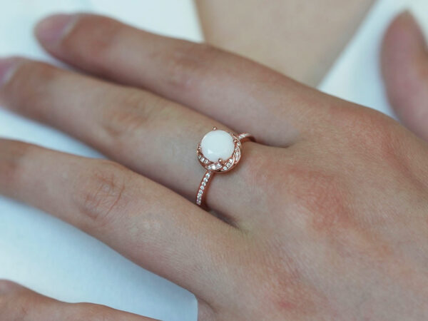 rose gold plated sterling silver ring, diamond-shaped breast milk stone with diamond crystals on the band and around the halo from KeepsakeMom