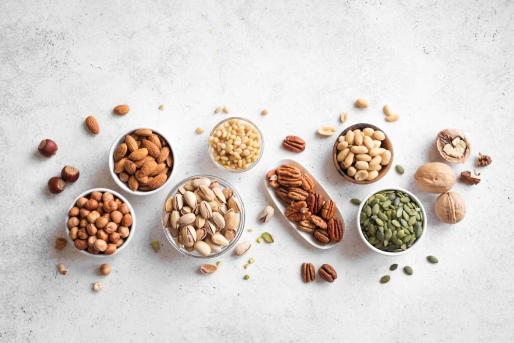 Bowls of nuts and seeds on a table