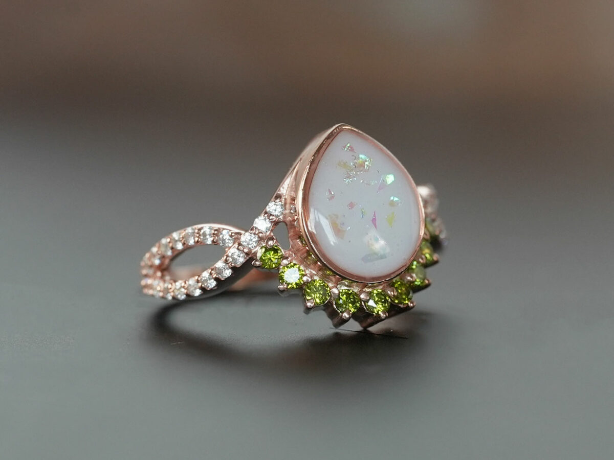 breastmilk jewelry ring crystals teardrop birth month color crystals teardrop from KeepsakeMom rose gold peridot