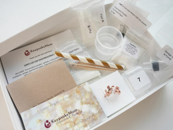 DIY Breast Milk Jewelry Making Kit from KeepsakeMom with Open Lid showing Contents of Kit