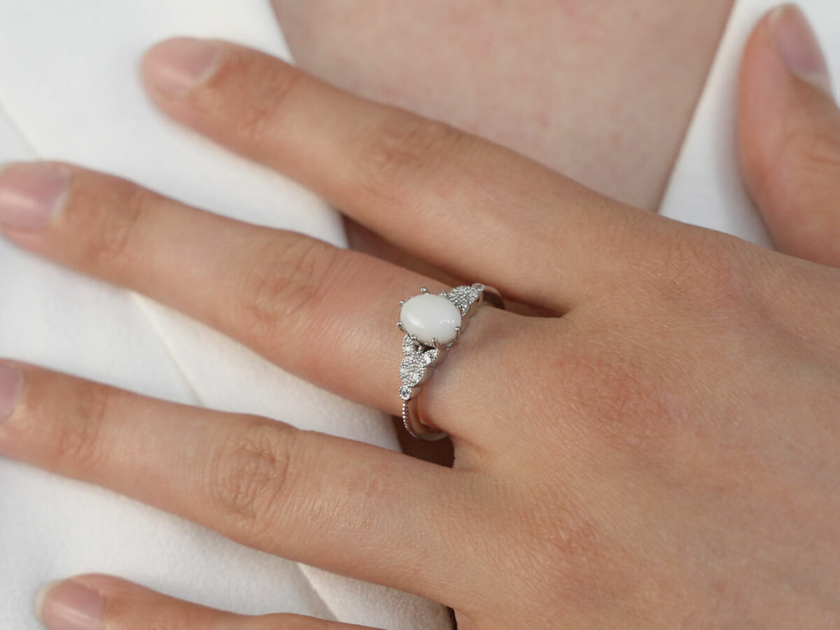 breastmilk ring oval stone sterling silver ring from KeepsakeMom white gold plating hand model