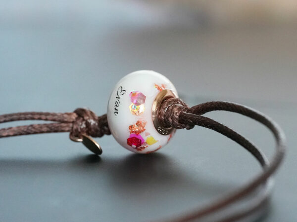 breastmilk jewelry bead bracelet with two birth month colors on brown cord from KeepsakeMom