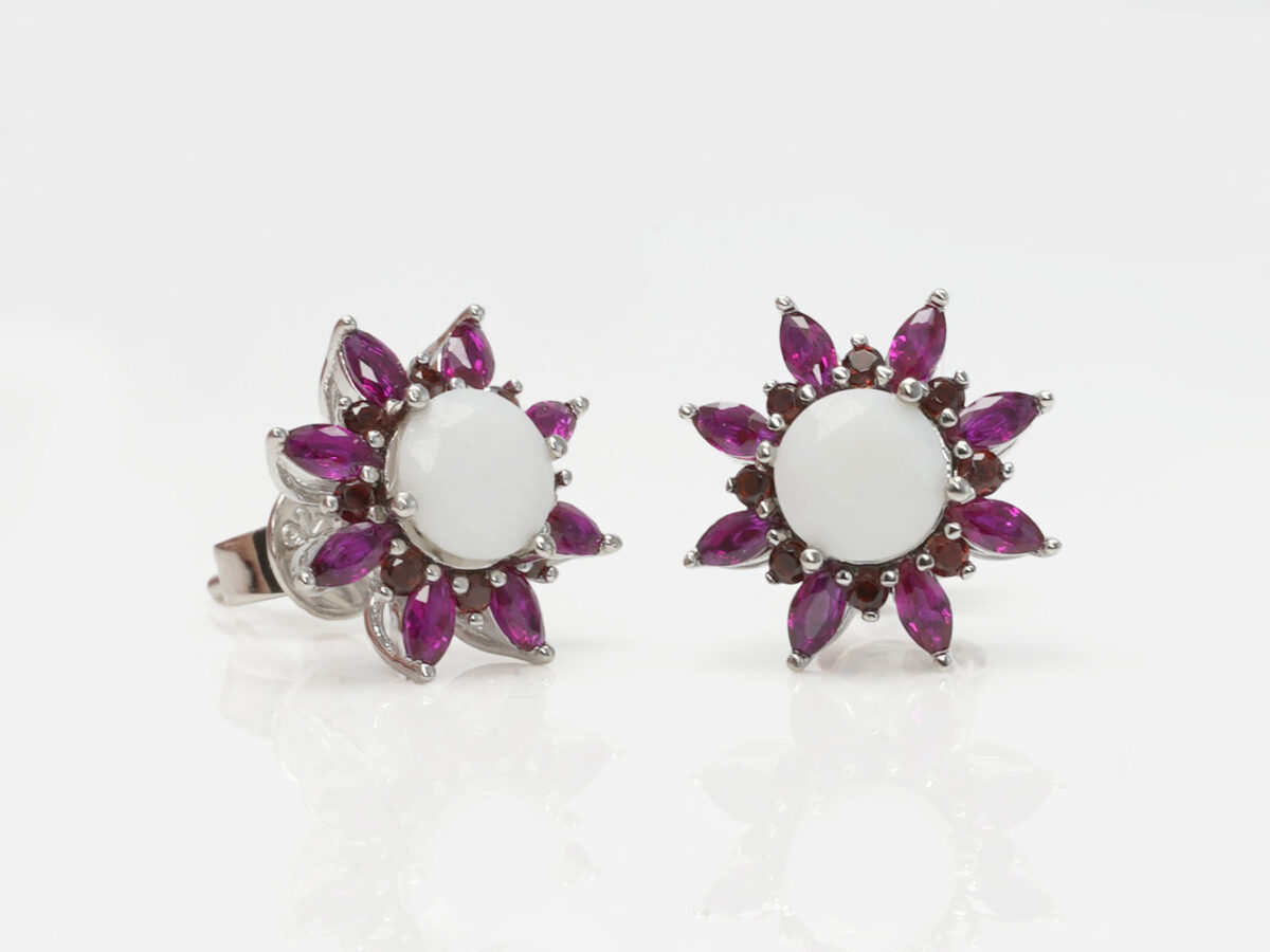breastmilk jewelry fancy star or flower shaped studded earrings with birth month colored gems ruby as leaves from KeepsakeMom on white background
