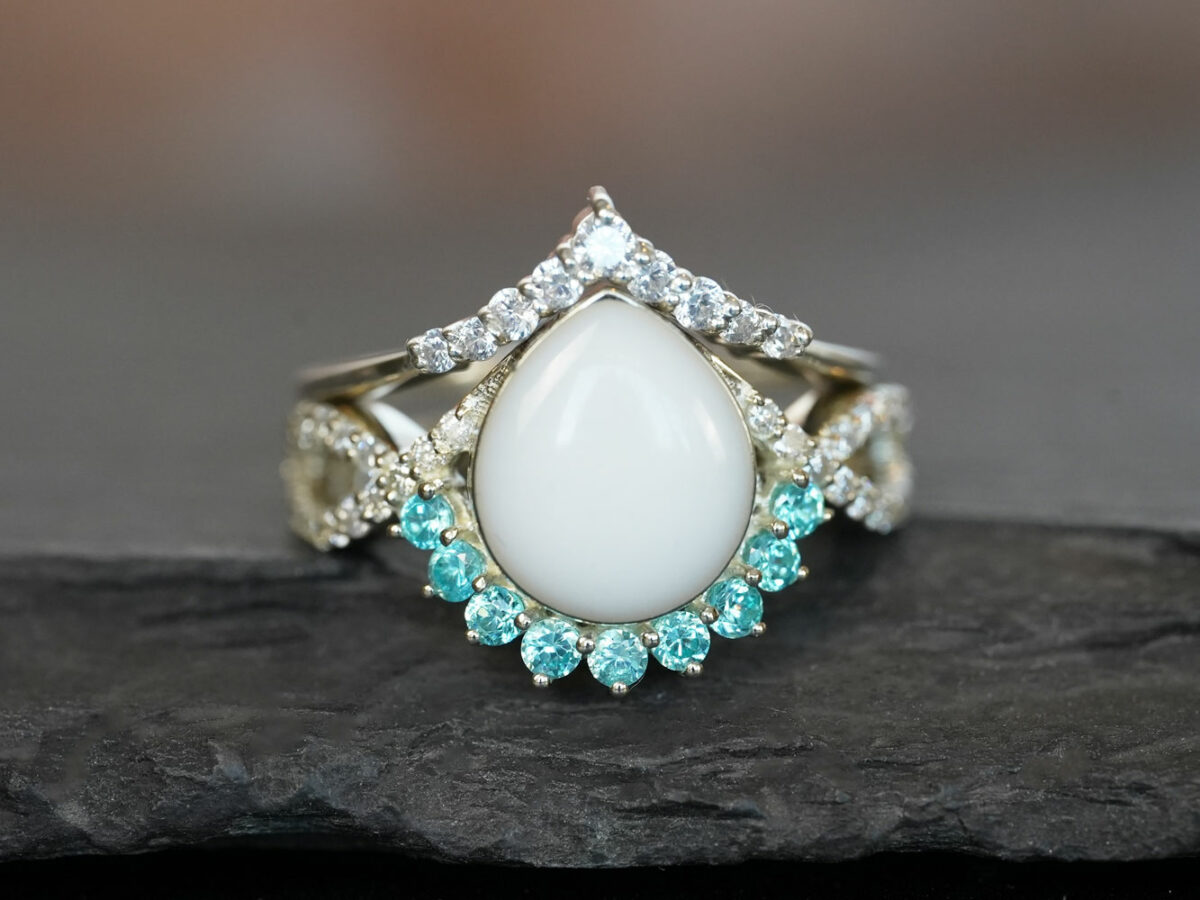 breastmilk jewelry ring crystals teardrop birth month color crystals teardrop from KeepsakeMom sterling silver white gold aquamarine crystals