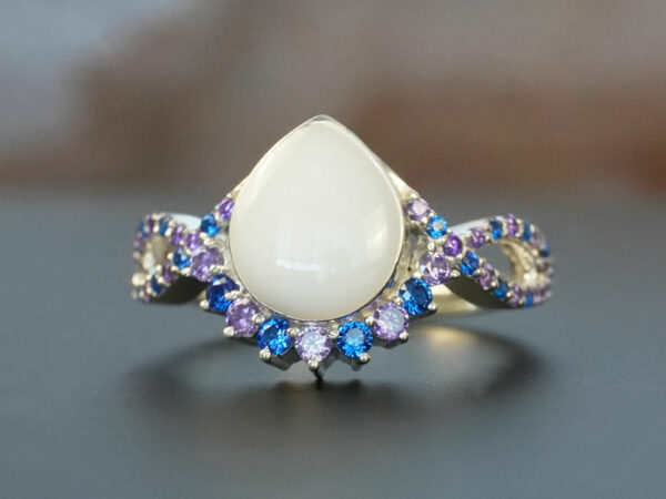 breastmilk jewelry ring crystals teardrop birth month color crystals teardrop from KeepsakeMom sterling silver white gold clear crystals blue purple