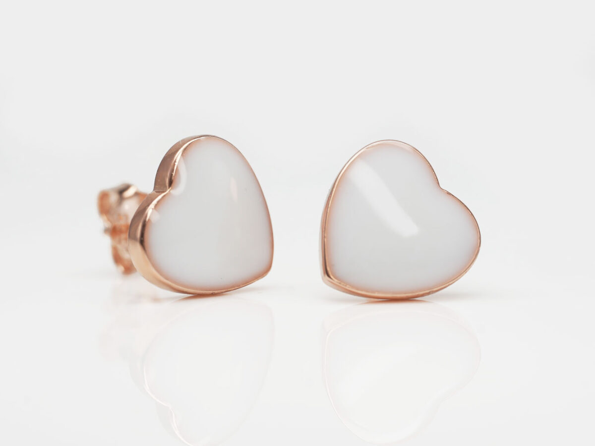 breast milk studded earring in rose gold heart shaped on white background from keepsakemom